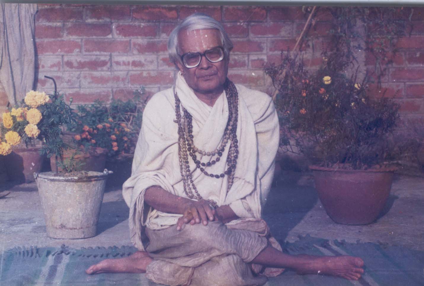 Figure 3: Srimat Bhumananda Dev, in Gomukhasana, a yogic posture he would always be seen in.